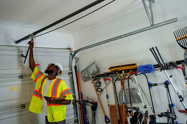 Professional Garage Door Panel Replacement technician working in Lima, OH